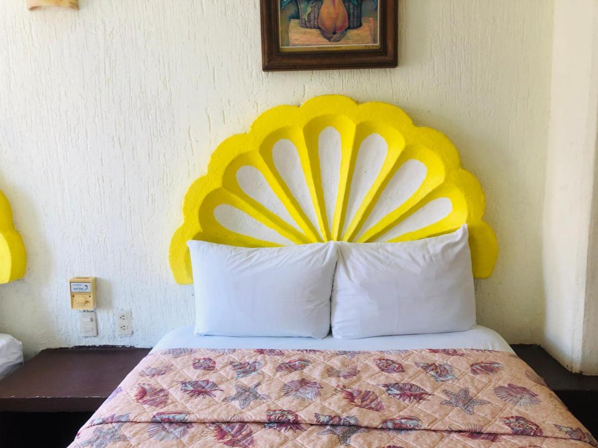 Hotel Playa Santa Cruz By Rotamundos Huatulco Exterior photo