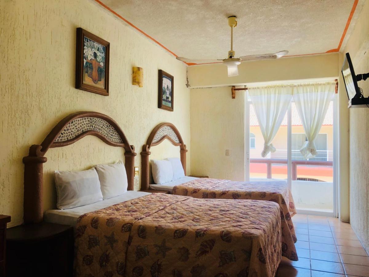 Hotel Playa Santa Cruz By Rotamundos Huatulco Exterior photo